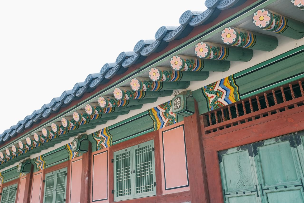 Detailed view of traditional Korean architecture featuring colorful and ornate design elements.